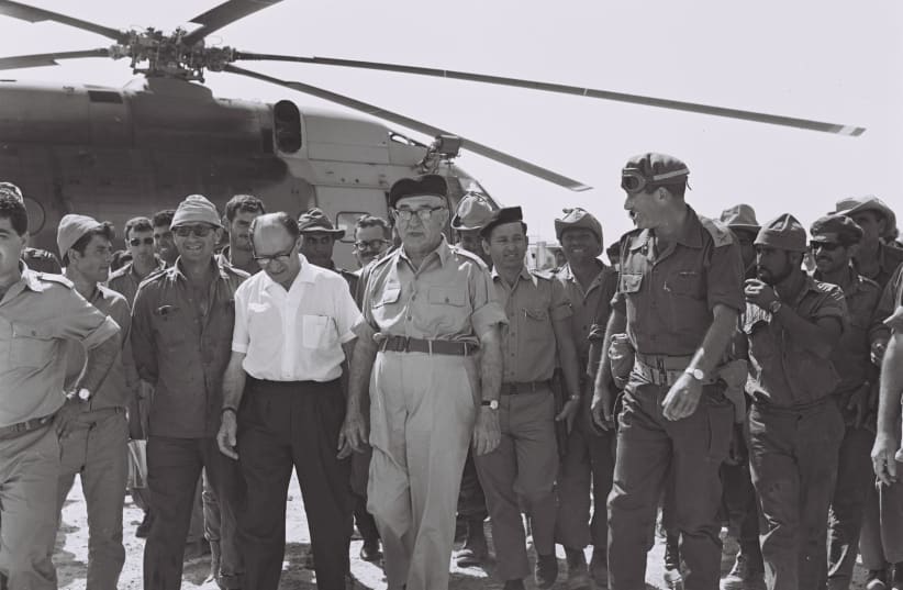  THEN-PRIME MINISTER Levi Eshkol (C), minister Menachem Begin (L) and Gen. Yeshayahu Gavish (R) visit reserve units in Sinai, June 13, 1967. (photo credit: Moshe Milner/GPO)