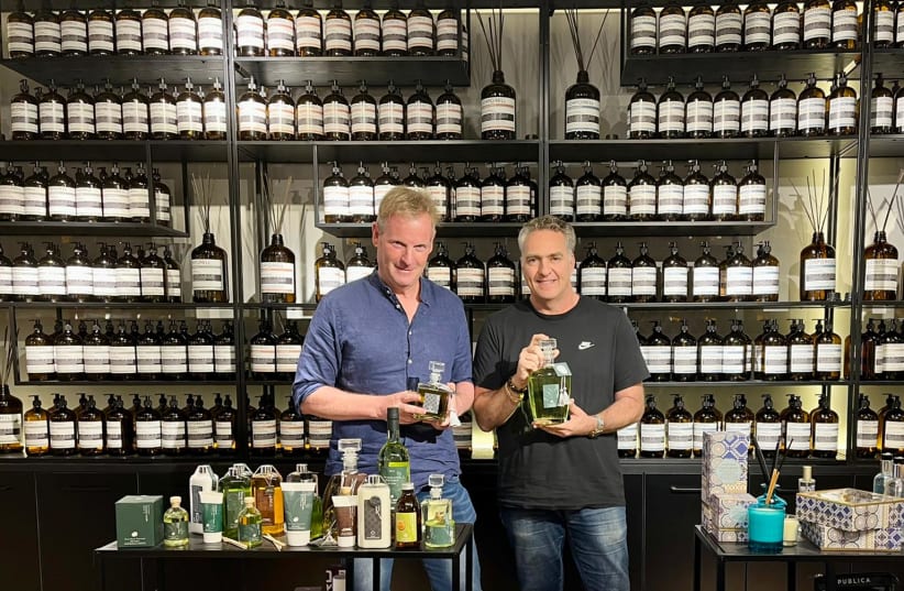  Daniel Marciano CEO Corporell LTD, creators of premium cosmetics & fragrances, (right) with the writer in Raanana. (photo credit: MOTTI VERSES)