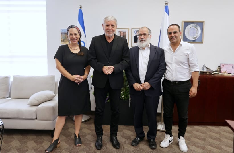  L to R: Yael Eckstein, president and CEO of International Fellowship of Christians and Jews; Labor Minister Meir Cohen; Rabbi Mendy Blau, Israel Director of Colel Chabad; Avi Ben Zikry, associate director-general of the Labor, Social Affairs and Social Services Ministry. (photo credit: IFCJ)