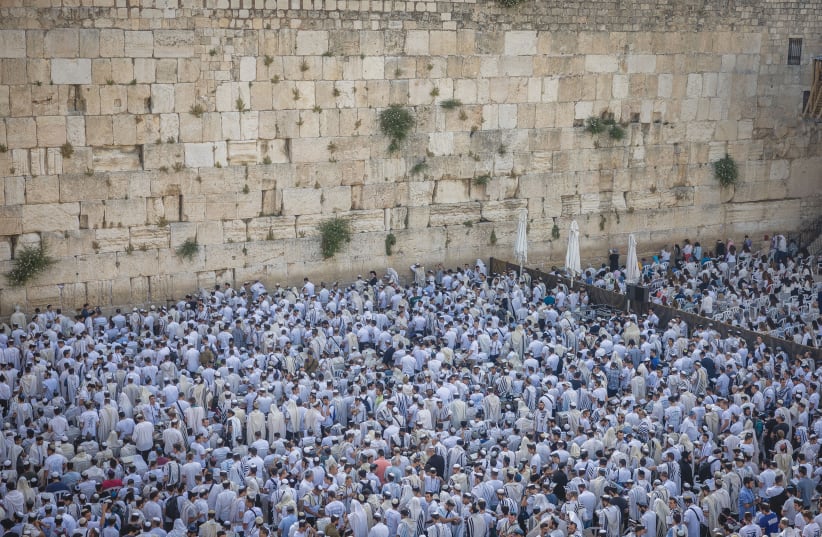  JEWS PRAY at the Western Wall on Jerusalem Day, last month. (photo credit: YONATAN SINDEL/FLASH90)
