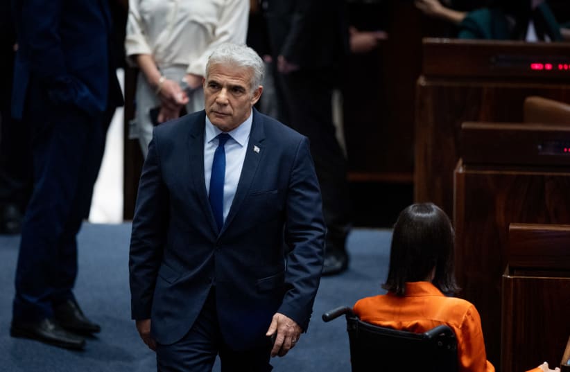  Minister of Foreign Affairs Yair Lapid seen during a plenum session in the assembly hall of the Israeli parliament, in Jerusalem on June 20, 2022. (photo credit: YONATAN SINDEL/FLASH90)