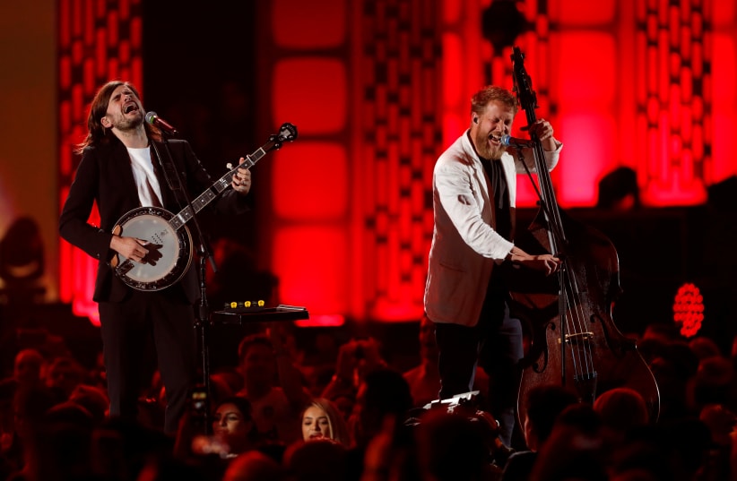  Mumford & Sons banjoist Winston Marshall (L) and bassist Ted Dwane perform during the iHeartRadio Music Festival at T-Mobile Arena in Las Vegas, Nevada, US September 21, 2019. (photo credit: REUTERS/STEVE MARCUS)