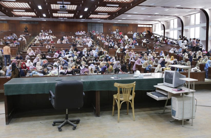 Students wait in a lecture hall at Mansoura University. (photo credit: REUTERS/NASSER NURI)