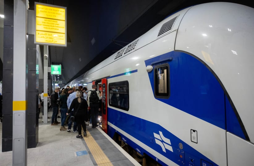  The first ride of the train between Jerusalem and Modi'in, at Yitzhak Navon train station in Jerusalem on March 31, 2022 (photo credit: YONATAN SINDEL/FLASH90)