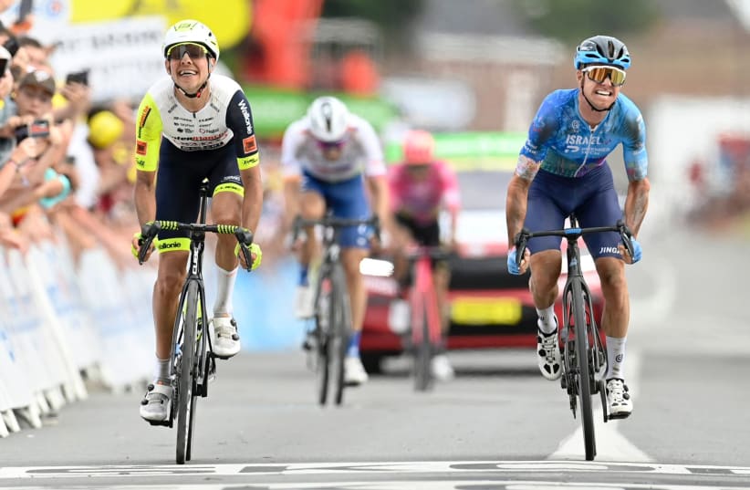  Cyclist Simon Clark takes the win at Round Five of the Tour De France for Israel-Premier Tech. (photo credit: SPRINT CYCLING)