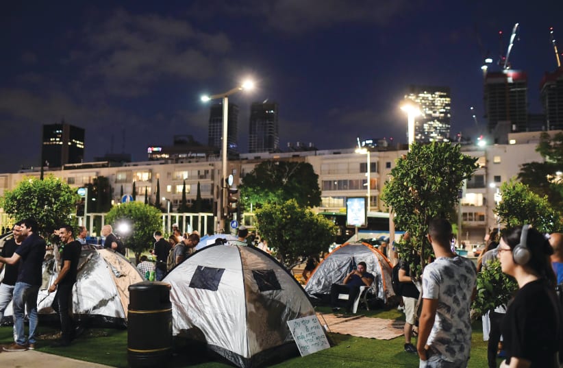  ISRAELIS SET UP tents last month on Rothschild Boulevard in Tel Aviv, to protest against the soaring housing prices in Israel and social inequalities.  (photo credit: TOMER NEUBERG/FLASH90)