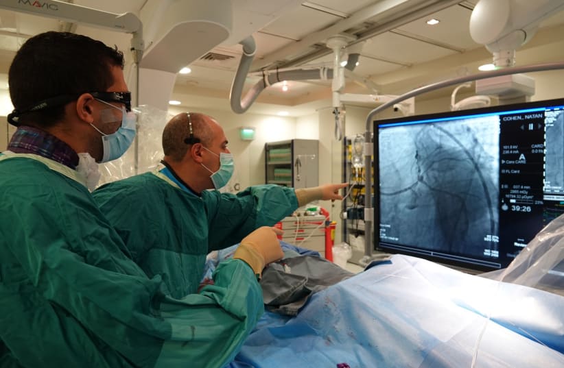  Dr. Danny Dvir during surgery at Shaare Zedek Medical Center. (photo credit: COURTESY OF SZMC)