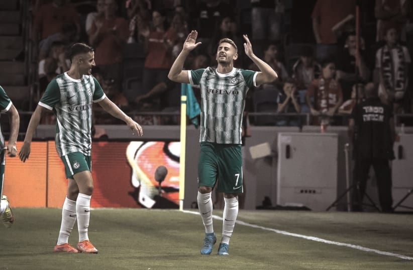  OMER ATZILY (right) and Maccabi Haifa have their work cut out for them tonight against visiting Olympiacos in Champions League action (photo credit: Israel Professional Football League/Courtesy)
