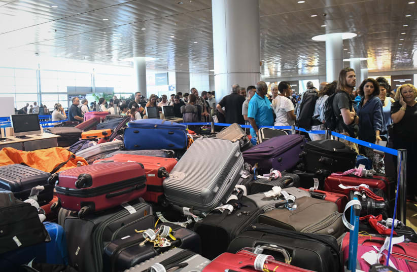  A malfunction in the luggage security system has left hundreds of passengers stuck at the Ben Gurion Airport, on August 12, 2019.  (photo credit: FLASH90)