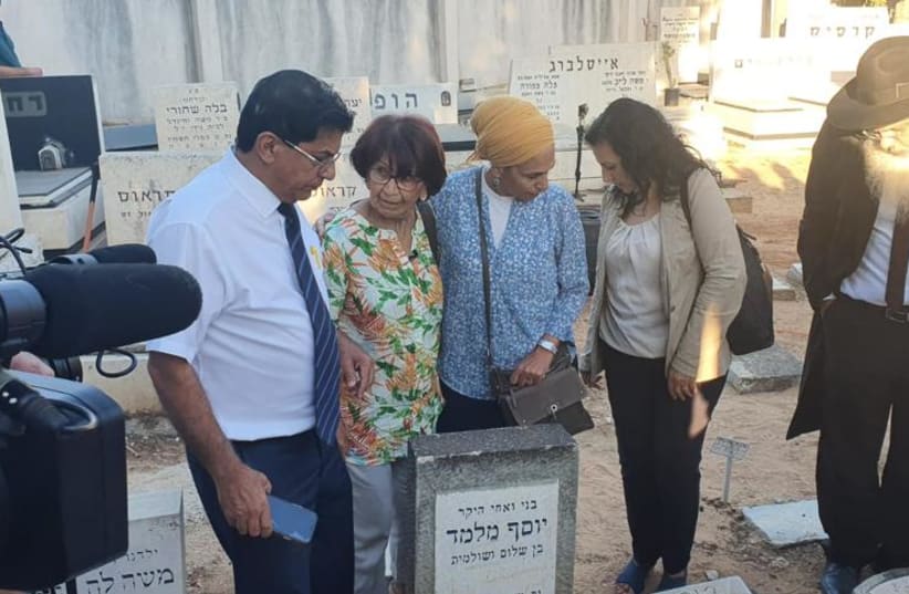  The Melamed family stands in front of Yossef's grave before it is opened. (photo credit: AVSHALOM SASSONI/MAARIV)