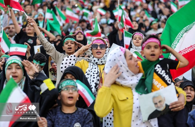 Iranians sing "Hello Commander" song at Azadi stadium in Tehran (photo credit: MEHDI MARIZAD/FARS NEWS AGENCY)
