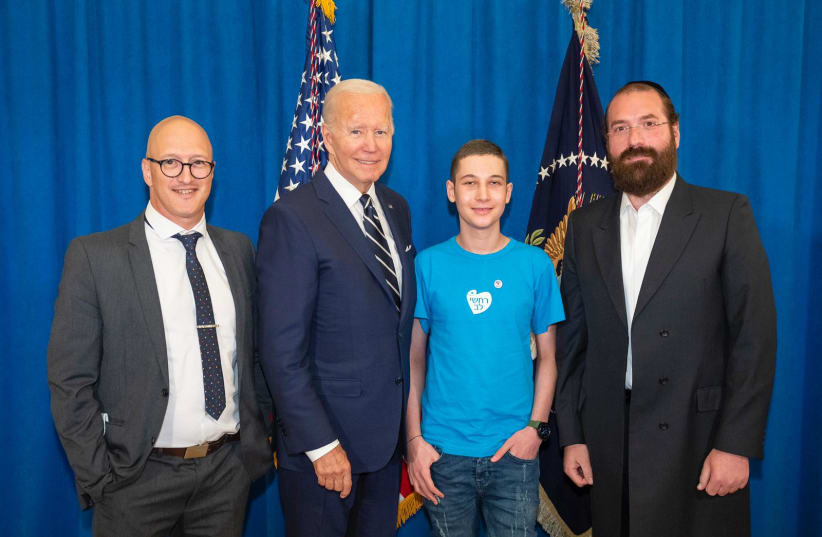 President Biden met Omer from the Israel Children's Cancer Support Center. On the left is Ze'ev Yanay of Galai Communications and on the right is Rachashei Lev CEO Shimi Gesheid. (photo credit: Israel Children's Cancer Support Center)