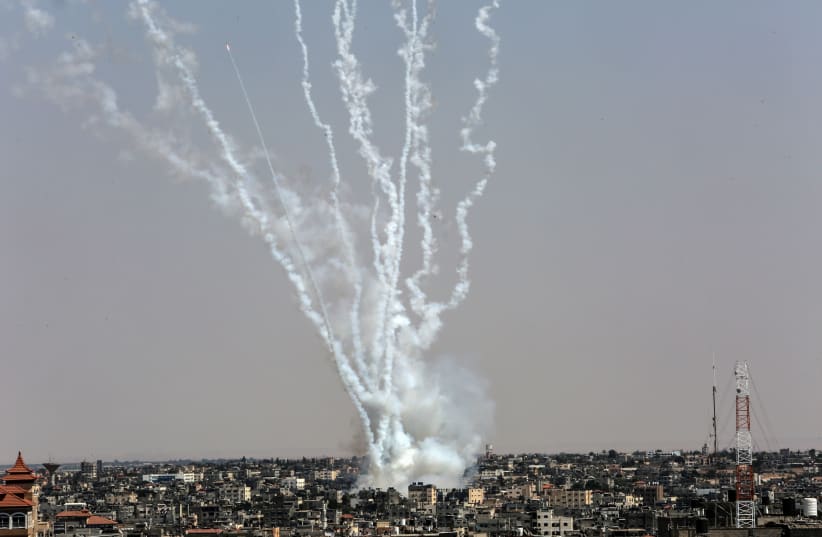  Rockets are fired toward Israel from Rafah, in the Gaza Strip, on August 7, 2022. (photo credit: ABED RAHIM KHATIB/FLASH90)