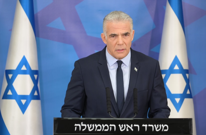  Prime Minister Yair Lapid giving an announcement, August 8, 2022.  (photo credit: AMOS BEN-GERSHOM/GPO)