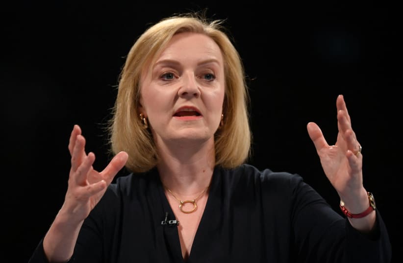 Britain's Conservative Party leadership candidate Liz Truss speaks during a hustings event, part of the Conservative party leadership campaign, in Cheltenham, Britain, August 11, 2022. (photo credit: REUTERS/TOBY MELVILLE)