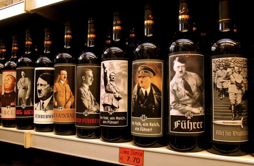  Bottles of Lunardelli Wine with labels depicting Nazi leader Adolf Hitler are displayed on a shelf in a wine shop near Venice, September 12, 2003 (photo credit: GIUSEPPE CACACE/GETTY IMAGES/VIA JTA)