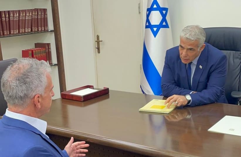  Prime Minister Yair Lapid meets with Mossad chief David Barnea on August 25. (photo credit: PRIME MINISTER'S OFFICE)