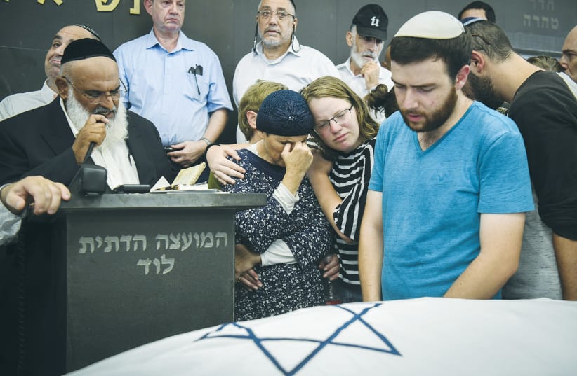  FAMILY AND friends attend the funeral of Rina Shnerb, August 2019.  (photo credit: FLASH90)