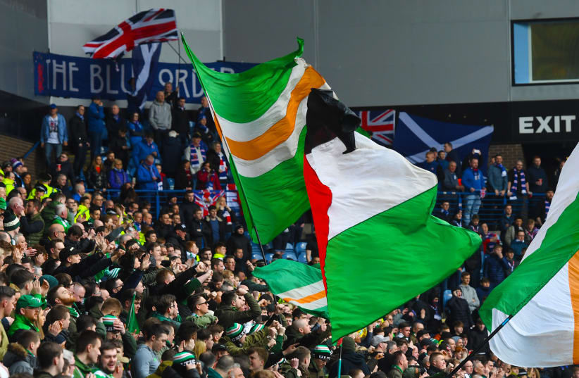  A Palestinian flag seen among Irish flags at a match against Rangers in Glasgow in 2018.  (photo credit: Craig Williamson/SNS Group via Getty Images)