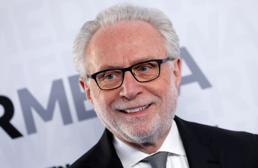 CNN television news anchor Wolf Blitzer poses as he arrives at the WarnerMedia Upfront event in New York City, New York, US, May 15, 2019. (photo credit: REUTERS/MIKE SEGAR)