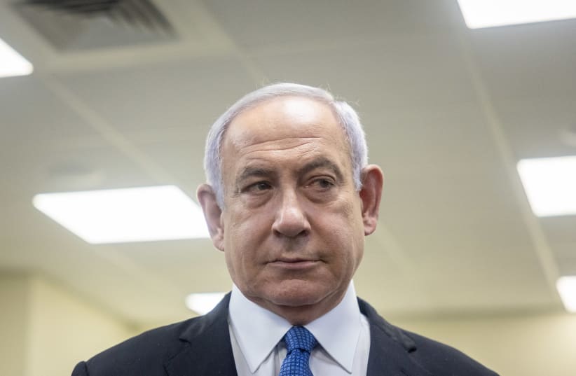  Opposition head Benjamin Netanyahu arrives to tesitfy before the Meron Disaster Inquiry Committee, in Jerusalem, on July 21, 2022 (photo credit: YONATAN SINDEL/FLASH90)