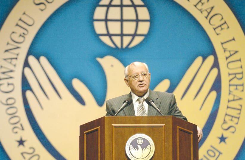  FORMER SOVIET leader Mikhail Gorbachev speaks during the opening ceremony of the 2006 Gwangju Summit of Nobel Peace Laureates in South Korea.  (photo credit: Kim Jae-hwan/Pool/Reuters)