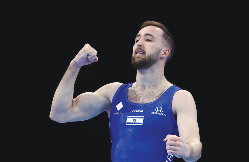  ARTEM DOLGOPYAT reacts during competition at the European Artistic Gymnastics Championship in Munich, last month. ‘I feel bad for him. I really do,’ says the writer, regarding the matter of marriage.  (photo credit: KAI PFAFFENBACH/REUTERS)