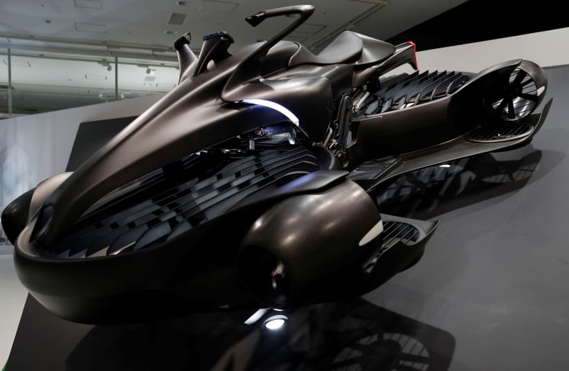  A.L.I technology's Xturismo air-mobility hover bike is displayed at the Tokyo Motor Show, in Tokyo, Japan October 24, 2019. (photo credit: REUTERS/EDGAR SU)