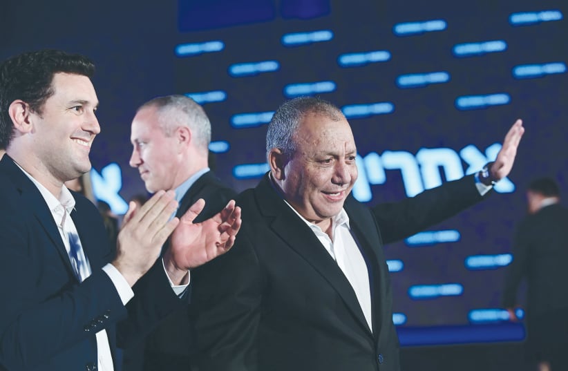  GADI EISENKOT waves at the launch of the National Unity Party election campaign, in Tel Aviv, earlier this month.  (photo credit: TOMER NEUBERG/FLASH90)