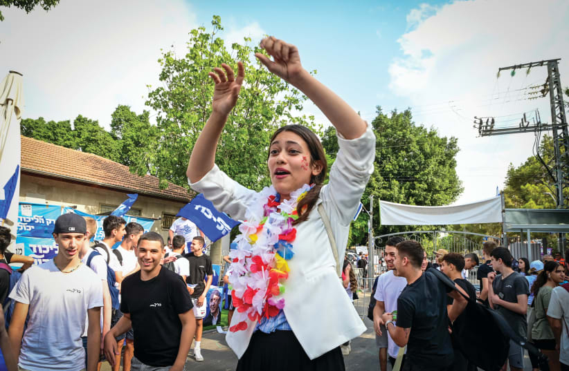  HADAR MUCHTAR, leader of the Fiery Youth movement, speaks to students from the Blich High School in Ramat Gan on Tuesday. (photo credit: AVSHALOM SASSONI/FLASH90)