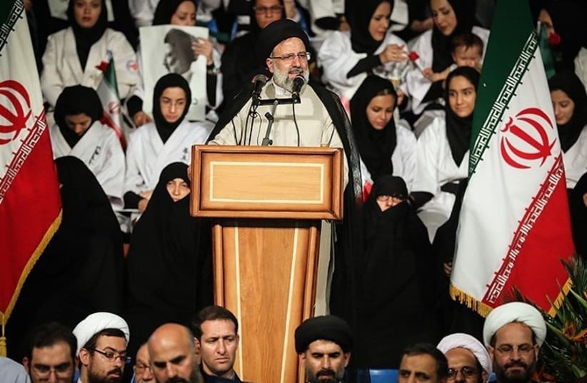 Ebrahim Raisi supporters campaigning in Tehran, Iran for 2017 presidential election (photo credit: TASNIM NEWS AGENCY/CC BY 4.0 (https://creativecommons.org/licenses/by/4.0)/VIA WIKIMEDIA COMMONS)