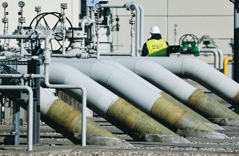  PIPES AT the landfall facilities of the ‘Nord Stream 1’ gas pipeline in Lubmin, Germany: European Union nations have shrunk away from energy independence for years, groveling to projects such as Nord Stream 1 and Nord Stream 2, says the writer.  (photo credit: HANNIBAL HANSCHKE/REUTERS)