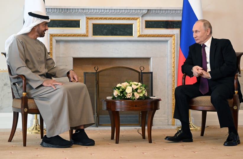  Russia's President Vladimir Putin attends a meeting with United Arab Emirates' President Sheikh Mohammed bin Zayed al-Nahyan in Saint Petersburg, Russia, October 11, 2022. (photo credit: Sputnik/Pavel Bednyakov/Pool via REUTERS)
