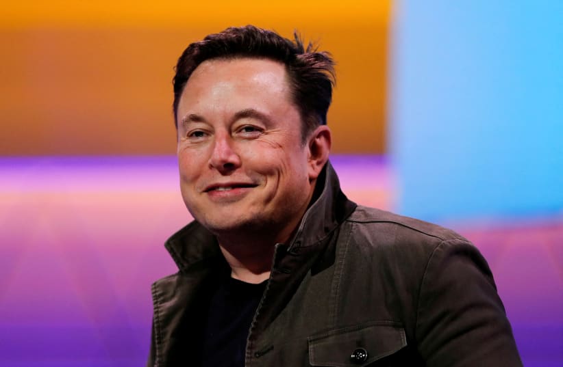 SpaceX owner and Tesla CEO Elon Musk smiles at the E3 gaming convention in Los Angeles, California, US, June 13, 2019. (photo credit: REUTERS/MIKE BLAKE/FILE PHOTO)