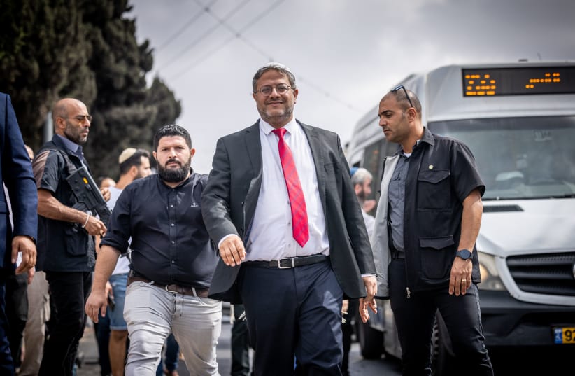  MK Itamar Ben Gvir, head of the Otzma Yehudit political party surrouned visits in Beit Orot, in the East Jerusalem neighborhood of At-Tur, October 13, 2022. (photo credit: YONATAN SINDEL/FLASH90)