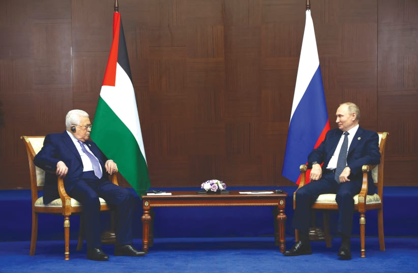  RUSSIA’S PRESIDENT Vladimir Putin and Palestinian Authority head Mahmoud Abbas meet on the sidelines of the Conference on Interaction and Confidence Building Measures in Asia, in Astana, Kazakhstan, last week. (photo credit: SPUTNIK/REUTERS)