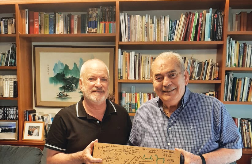  CHEF SHALOM KADOSH (R) with the writer, holding the gift box signed by great chefs from all over the world.  (photo credit: Shalom Kadosh)