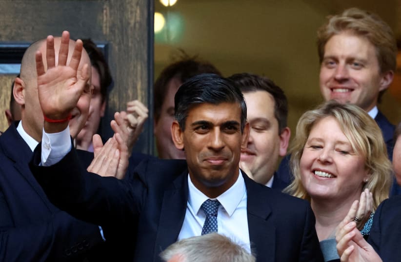  New leader of the Britain's Conservative Party Rishi Sunak walks outside the Conservative Campaign Headquarters, in London, Britain October 24, 2022. (photo credit: REUTERS/HANNAH MCKAY)