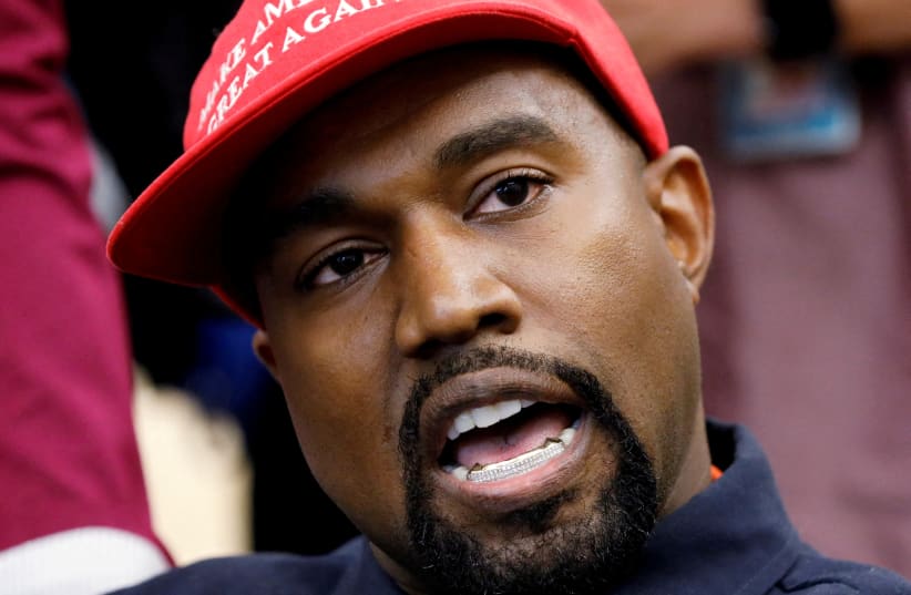 Rapper Kanye West speaks during a meeting with US President Donald Trump to discuss criminal justice reform in the Oval Office of the White House in Washington, US, October 11, 2018. (photo credit: REUTERS/KEVIN LAMARQUE/FILE PHOTO)