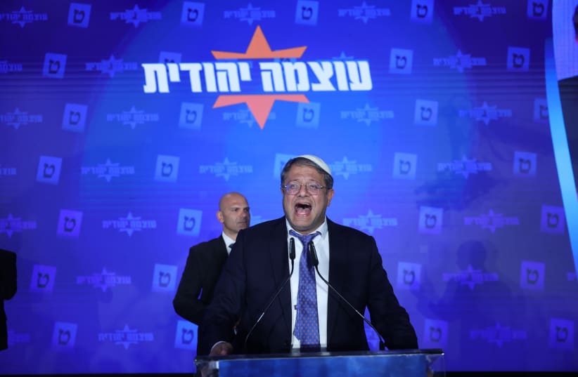  Head of the Otzma Yehudit party Itamar Ben Gvir speaks to supporters as the results of the exit polls for the Israeli elections are announced, at the party's campaign headquarters, November 1, 2022. (photo credit: YONATAN SINDEL/FLASH90)