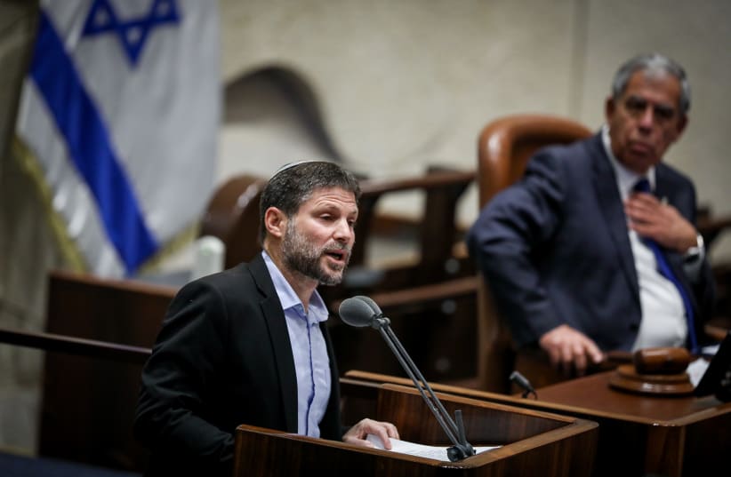 Religious Zionist party head MK Bezalel Smotrich speaks at the plenium hall during memorial ceremony marking 27 years since the assassination of former Israeli Prime Minister Yitzhak Rabin, at the Knesset, Israel's parliament, in Jerusalem on November 6, 2022 (photo credit: NOAM REVKIN FENTON/FLASH90)
