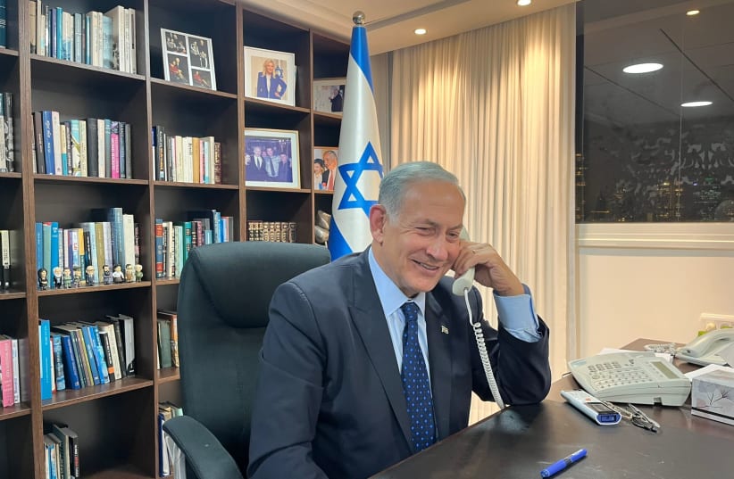 Benjamin Netanyahu on the phone with US President Joe Biden. (photo credit: LIKUD SPOKESPERSON)