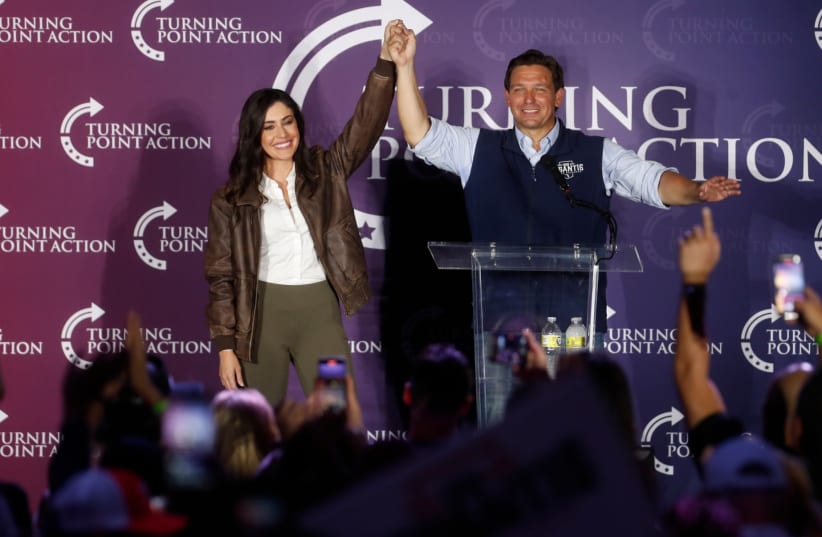  Florida Gov. Ron DeSantis and Anna Paulina Luna are greeted by supporters at the OCC Roadhouse & Museum in Clearwater, Fla., Nov. 5, 2022. (photo credit: OCTAVIO JONES/GETTY IMAGES)