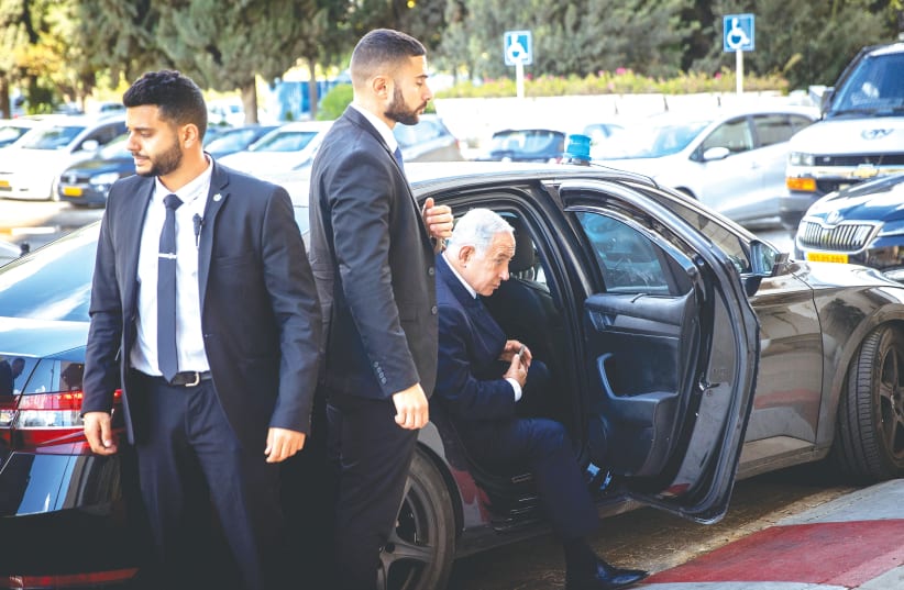  LIKUD CHAIRMAN Benjamin Netanyahu arrives for coalition talks at a hotel in Jerusalem on Wednesday. (photo credit: YONATAN SINDEL/FLASH90)