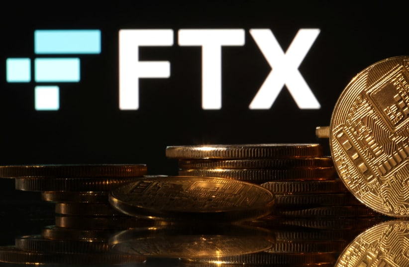  Representations of cryptocurrencies are seen in front of displayed FTX logo in this illustration taken November 10, 2022. (photo credit: REUTERS/DADO RUVIC/ILLUSTRATION)