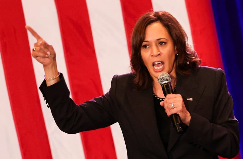 US Vice President Kamala Harris speaks on stage at "Get Out the Vote" rally at UCLA, in Los Angeles, California, US, November 7, 2022. (photo credit: REUTERS/MIKE BLAKE)