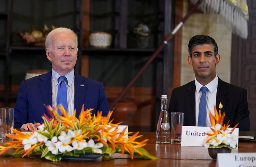  US  President Joe Biden and British Prime Minister Rishi Sunak attend an emergency meeting of global leaders after an alleged Russian missile blast in Poland, in Bali, Indonesia, November 16, 2022. (photo credit: REUTERS/KEVIN LAMARQUE)