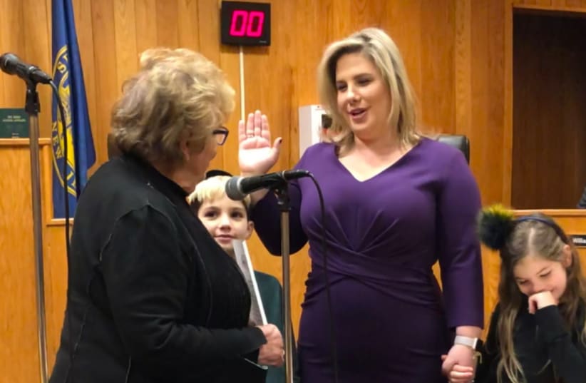  Cheryl recently served as an elected city councilmember in Englewood, NJ for three years. Being sworn in as a city councilmember by NJ Senate Majority Leader Loretta Weinberg in Englewood, NJ in 2018. (photo credit: Cheryl Rosenberg)