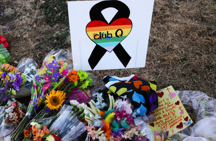  Floral tributes are placed in memory of the victims after a mass shooting at the Club Q gay nightclub in Colorado Springs, Colorado, U.S., November 20, 2022 (photo credit: REUTERS/KEVIN MOHATT)