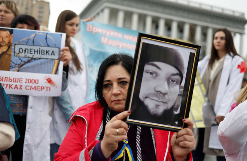  Relatives of Ukrainian prisoners of war (POWs) attend a rally demanding to speed up their release from a Russian captivity, in Kyiv (photo credit: REUTERS)